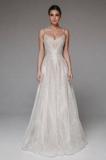 Robe Longue brodée blanche – Encolure dos en V et silhouette fluide d’été