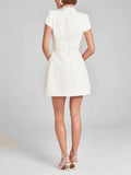 Robe Midi Élégante avec Détails de Perles – Col Bijou et Poches Ornementées