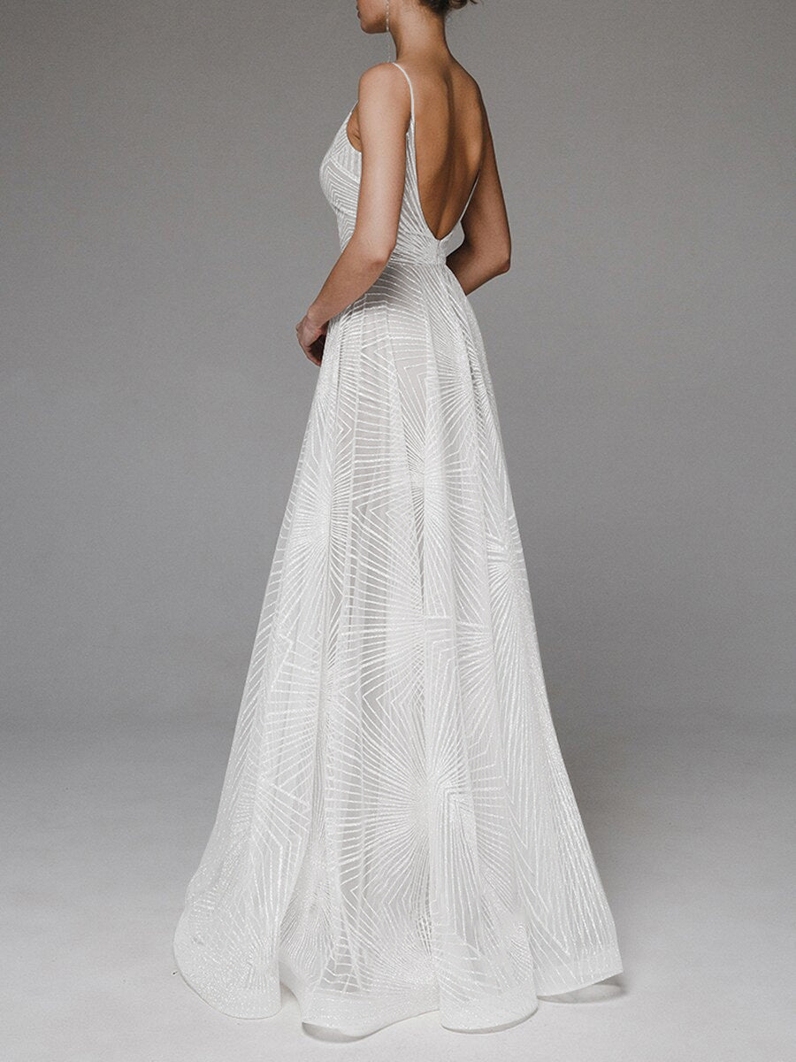 Robe Longue brodée blanche – Encolure dos en V et silhouette fluide d’été