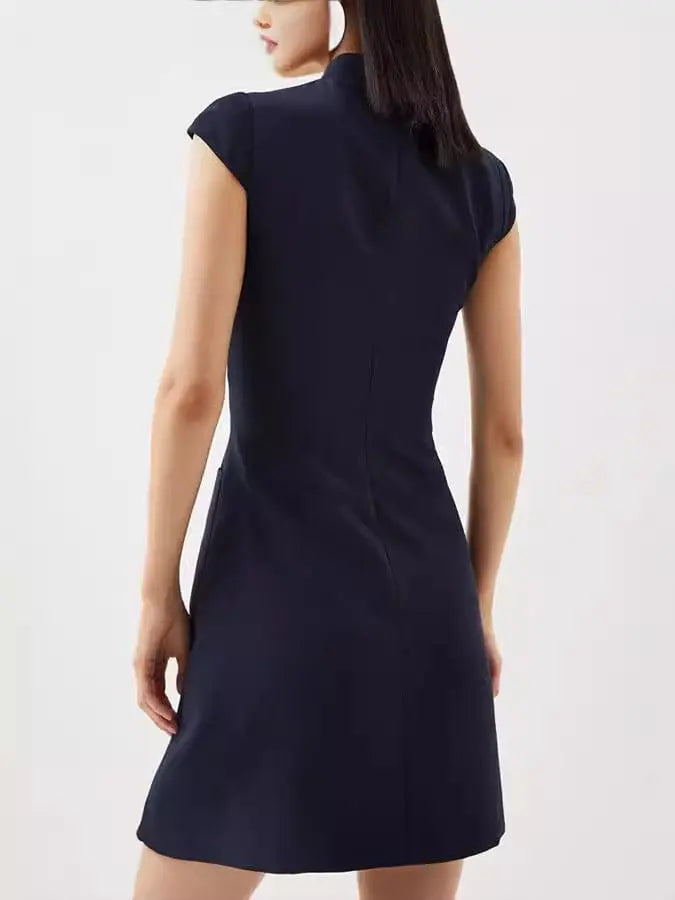Robe Mini Plissée à Mancherons – Élégance Structurée et Féminine 
