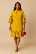 Robe mi-longue chaude, col nœud papillon, manches et bas à volants 