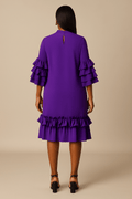 Robe mi-longue chaude, col nœud papillon, manches et bas à volants 